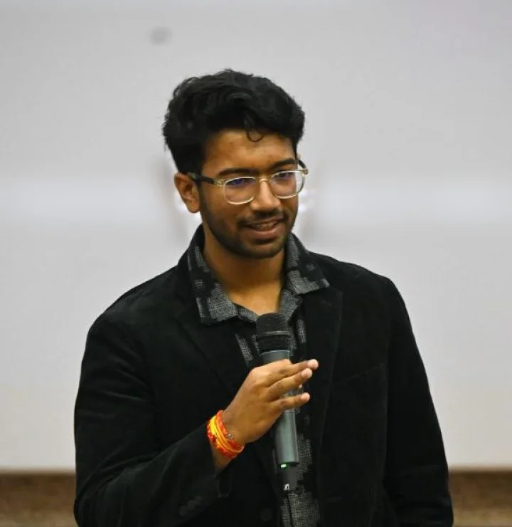 Akshit Kumar Singh, founder of Neyven, speaking on stage